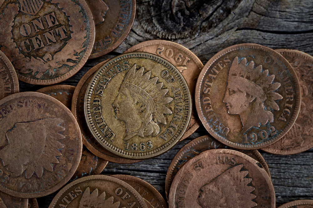 Vintage Indian Head pennies from the 1800s and early 1900s shown for appraisal by Coin Buyers in Midland.